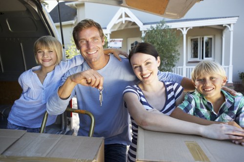 Professional movers handling furniture